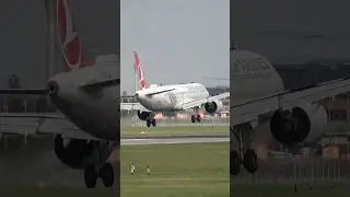 Hard A321neo landing at LHR