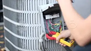 Checking Current On Air Conditioning Unit. Stock Footage