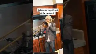 Watch what he pulls out of the cupboard…