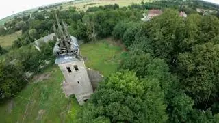 Medieval tower in lush green landscape on a summer day