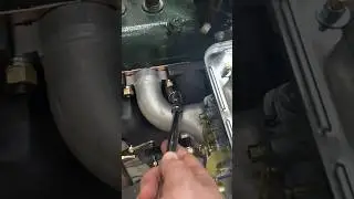 I couldn’t get any of my tools to fit in this tight spot around the header on my model A 