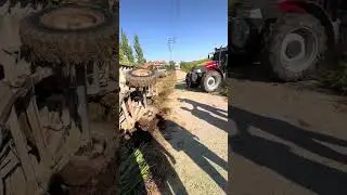 YATAN RÖMORKU ZİNCİRLE ASILAN TRAKTÖR