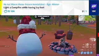 Light a Campfire while having icy feet Fortnite Winterfest
