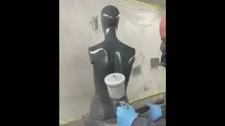 spray painting a mannequin