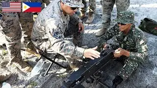 Philippines-US forces sink warship in China Sea military drills