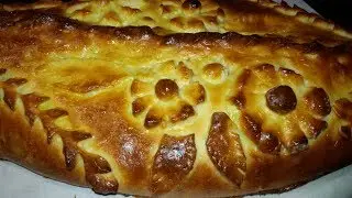 Кулебяка с капустой, луком и яйцом.