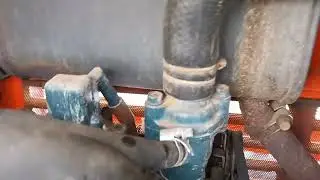 Установка электрокотла подогревателя Лунфей на тоактор Kubota L1-225