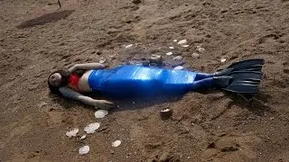 Русалка на пляже в Астане