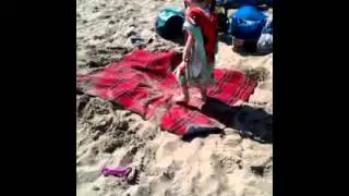 My little brother fell into a hole in the sand