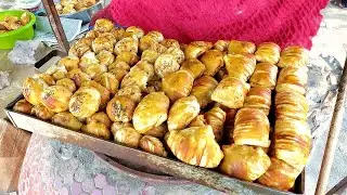 Uzbekistan street food. Samosa in tandoor. Uzbek samosa in tandoor. Kyrgyzstan street food. Samosa.