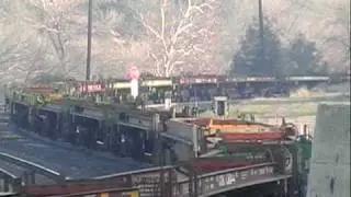 BNSF 5529 With Empty Coil & UP 3810 With Work Train, Woodford 01/31/09