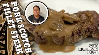 "Butcher's Tip: Perfectly Cooked Pork Scotch Fillet Steak with Flavorful Mushroom Sauce"