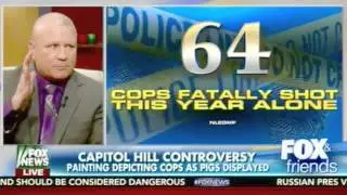 Congressman Hangs Cops Depicted as Pigs in Capitol Building