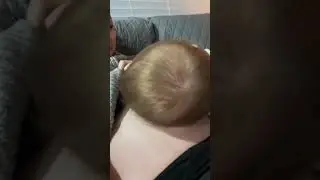 Baby blows raspberries on mom's pregnant belly!