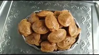కొబ్బరి గుల్లలు. (ఇదిపాతకాలం అమ్మమ్మల రసగుల్ల)