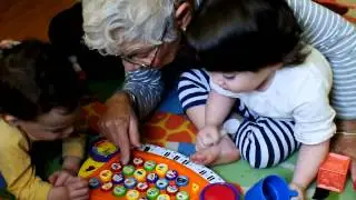 Rita with sam and noah playing