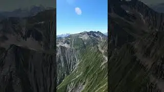 Flying on a paraglider between Gudauri and Pasanauri with a view of Kazbegi #paragliding #georgia