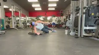 Side plank single arm cable row