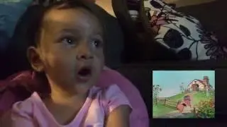 Elliana watching Disney's Three Little Pigs - Sing-along