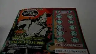Scratching Off Several Wizard of Oz Instant Lottery Tickets