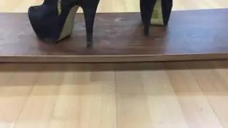 Girl crush wood panel with high heels boots
