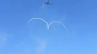 Nigel Hopkins  and Jason Beamish making the Perfect Aviation Love Heart at SAAF Musuem Airshow.