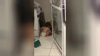 Baby calms down dog scared of thunderstorm