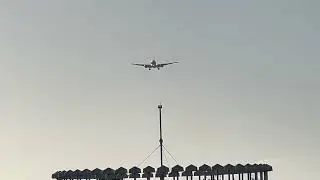 777 Landing at GCM Airport