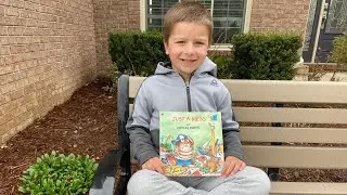 Landon reading “Just a Mess”