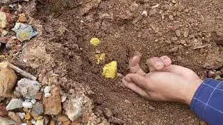 Finding treasure gold under stone