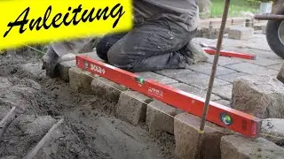Pflasterfläche mit Natursteinen einfassen, Schritt für Schritt