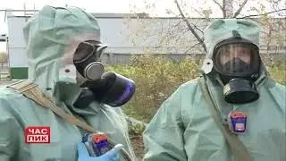 Women talking in gas masks