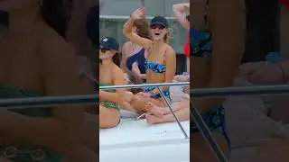 Ladies Radiate Cheer in Miami, Waving at Boatsnaps Cameras! 🚢💃🌞 Vibrant Vibes on the Yacht Bow