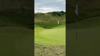 Tommy Fleetwood and Collin Morikawa throwing darts