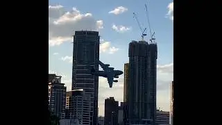 Awesome video of the C-17 flying low through Brisbane!
