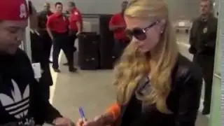 Paris Hilton Greets Fans and Give Autographs Photo signing