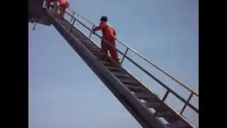 Offshore oil platform Indonesia. Upstairs to upper deck. A day in the offshore life