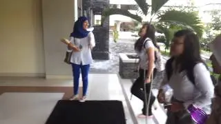 Eshabel with leg in cast climbing stairs