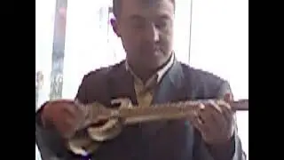 Snake Skin instrument in music shop, in Kashgar, Xinjiang Province