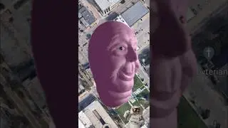 found strange face at Cedar Rapids Art Museum on Google earth 