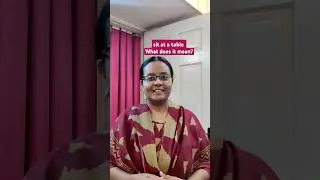 sit at a table | prepositions | English with Vennila
