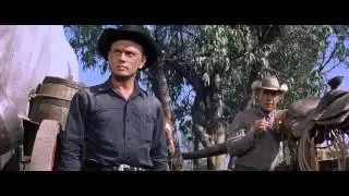 Switchblade against gun in The Magnificent Seven, 1960