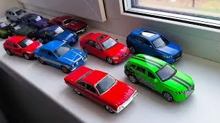 Hand Play With Toy Cars on a Windowsill