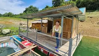 The girl has completed the hallway for the house floating on the water.