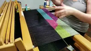 Weaving triple clasped weft on a floor loom