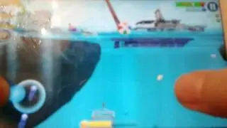 Я играю в Hungry  Shark  World  ( часть 2).