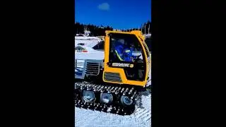 Snow Rabbit snowgroomer moving hard artificial snow in Holmenkollen