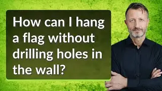 How can I hang a flag without drilling holes in the wall?
