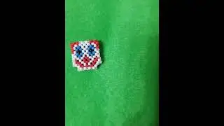 Клоун из бисера в технике крестик
