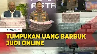 Barang Bukti Berupa Tumpukan Uang Pengungkapan Kasus Judi Online di Indonesia